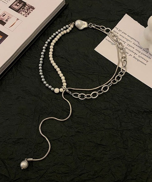 Asymmetrical pearl chain necklace